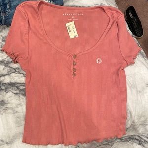 New never worn tag still on it light pink/coral color